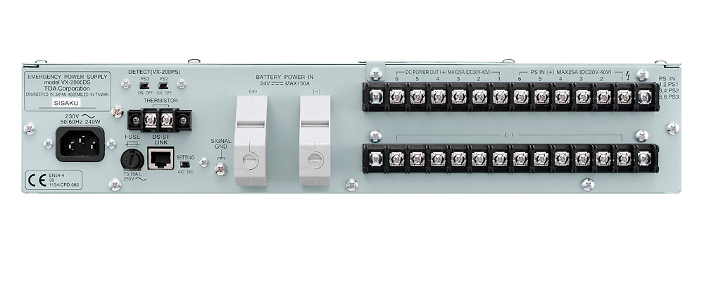 TOA-VX-2000DS-TOA-ups-evacuacion-conexiones Detalle del TOA VX-2000DS mostrando conexiones DC, control RJ45 y estructura robusta con carcasa negra para instalaciones profesionales